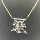 Spiderweb necklace made with upcycled LEGO® and matching cord