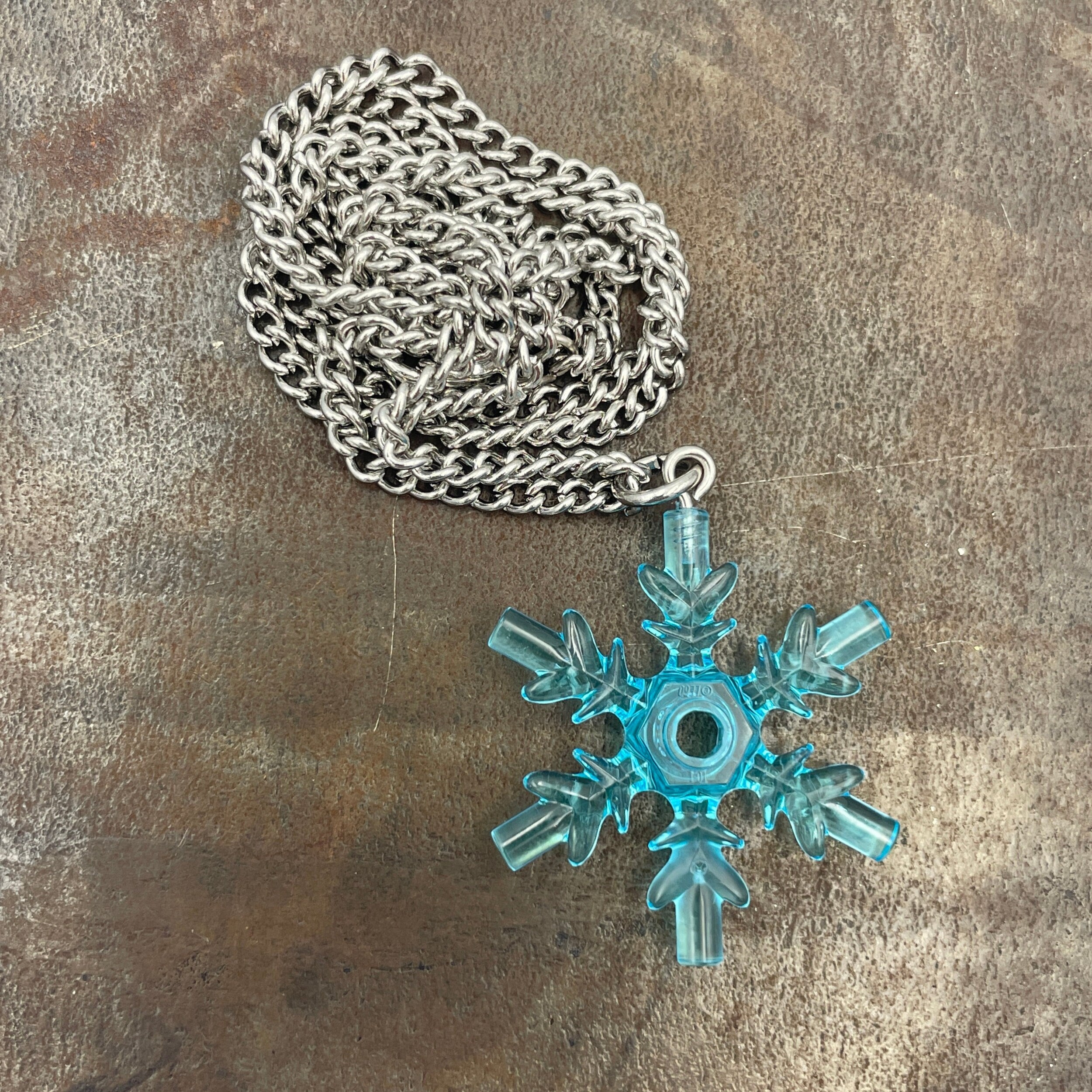 Snowflake necklace made with upcycled LEGO® on Curb Chain