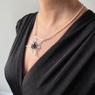 Spiderweb necklace made with upcycled LEGO® and matching cord