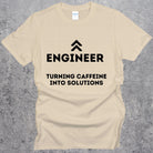 Engineering Turning Caffeine into Solutions T-shirt. Coffee Funny Engineer Top Sand