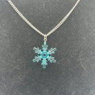 Snowflake necklace made with upcycled LEGO® on Curb Chain