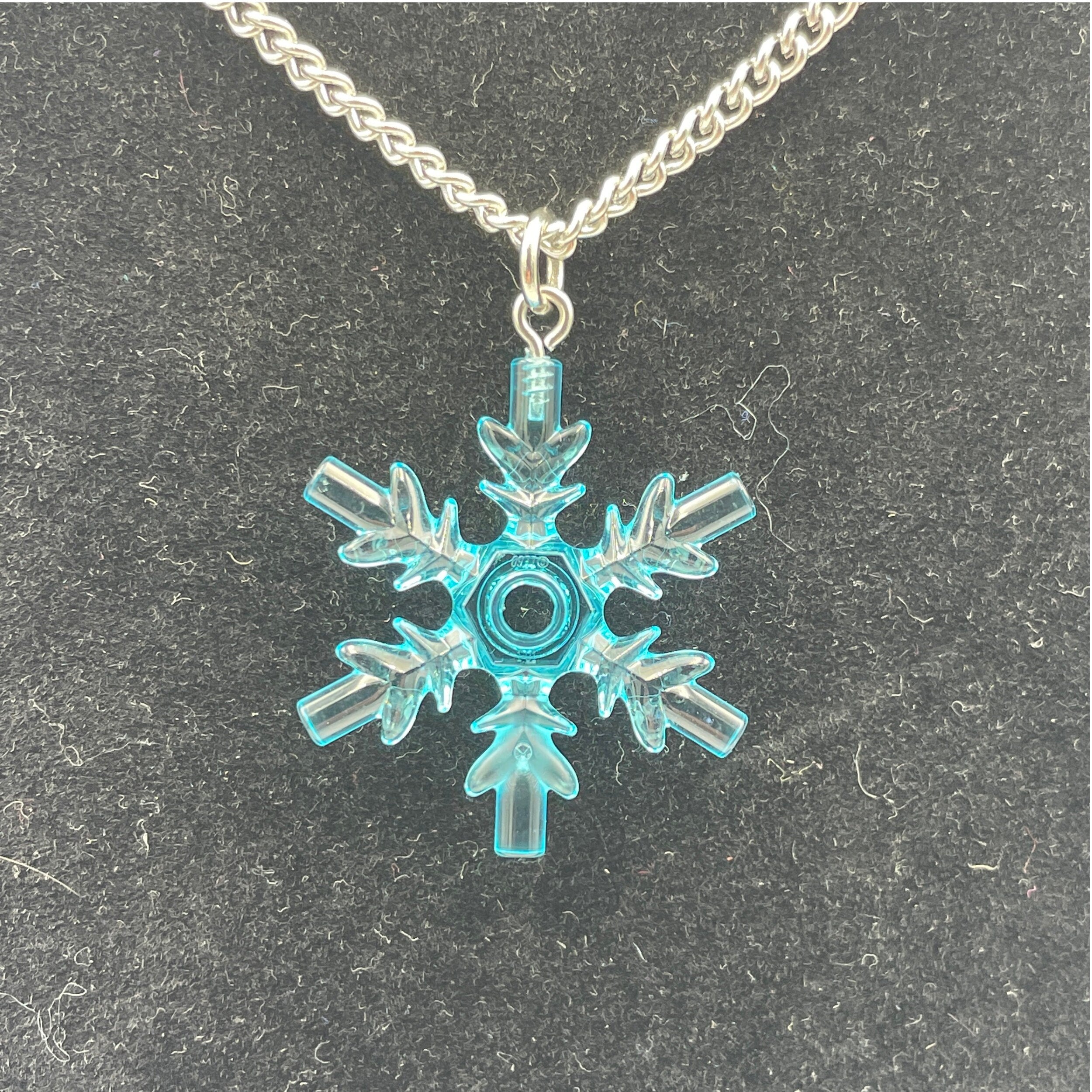 Snowflake necklace made with upcycled LEGO® on Curb Chain